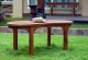 Table basse de jardin en teck huilé - modele peanut -
