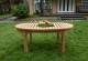 Table basse de jardin en teck brut - modele peanut -