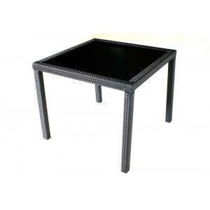 Table en résine tressée et verre de jardin